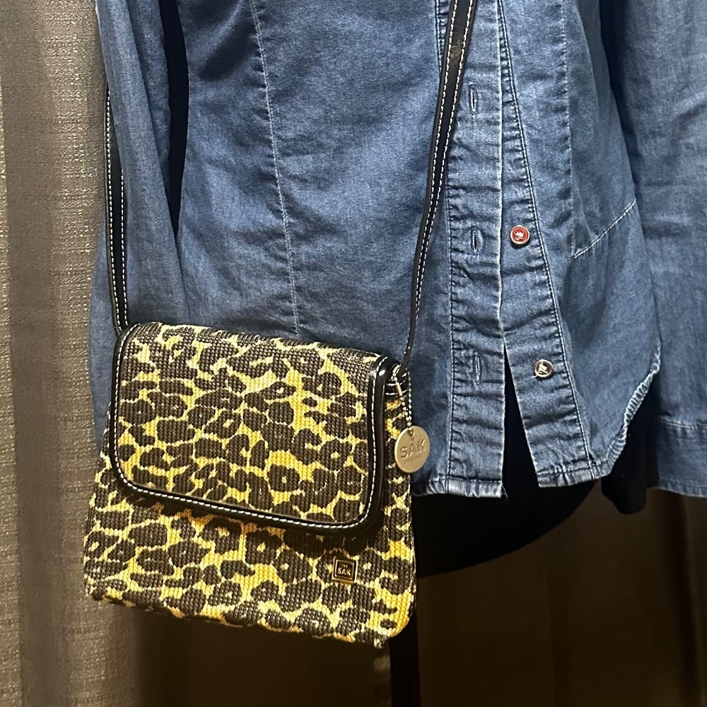 The SAC original cute and sophisticated Small Tan/Brown Crossbody bag.